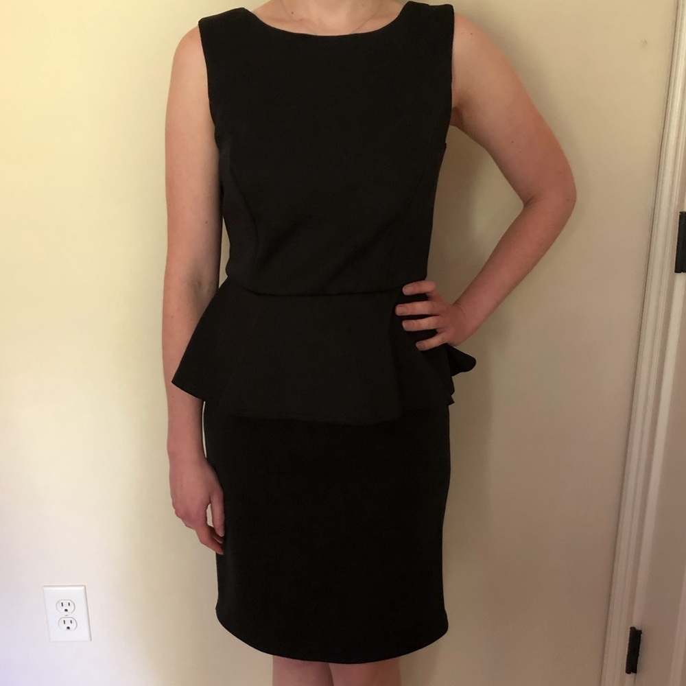 Spence sleeveless black peplum dress